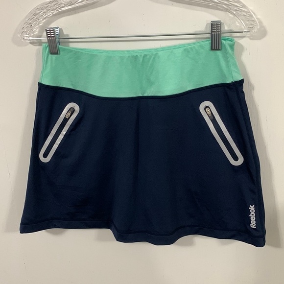 Reebok Skort size small green and blue zipper pockets very good condition - Picture 1 of 6